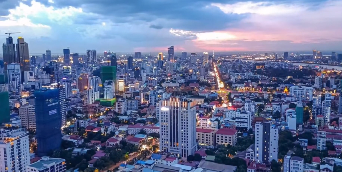 Why should I set up my business in Cambodia over neighboring countries?