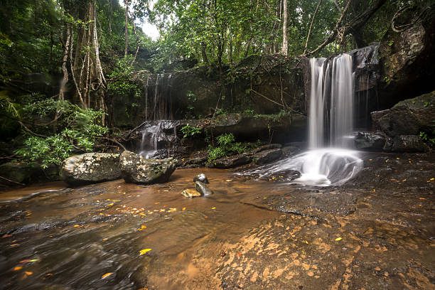 Kbal Spean is an Angkorian era archaeological site on the southwest slopes of the Kulen Hills to the northeast of Angkor in Siem Reap. The site consists of a series of stone rock relief carvings in sandstone formations of the river bed and banks. Cambodia Time