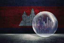 Why is Cambodia in debt with $9 billion?